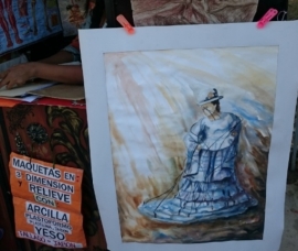 Una de las pinturas de Rosaura que se exhibe en su puesto.